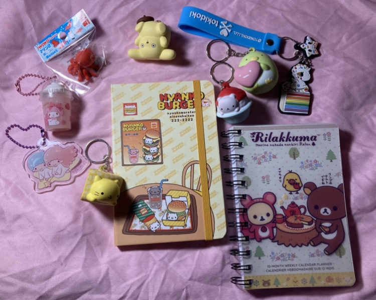 keychains, a planner, a notebook, a figurine, and an octopus eraser